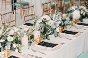 A table decorated for a wedding reception.